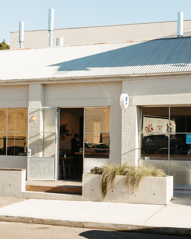 An exterior view of Deluca Coffee's cafe and roastery in Marrickville.